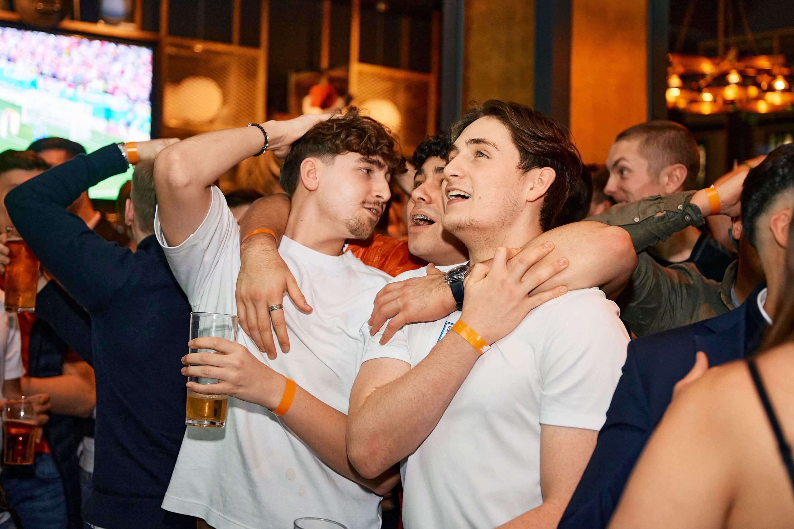 Football fans watching the big match at Ludo